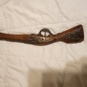 Brown and Silver Decorative Accents with Intricate Metalwork